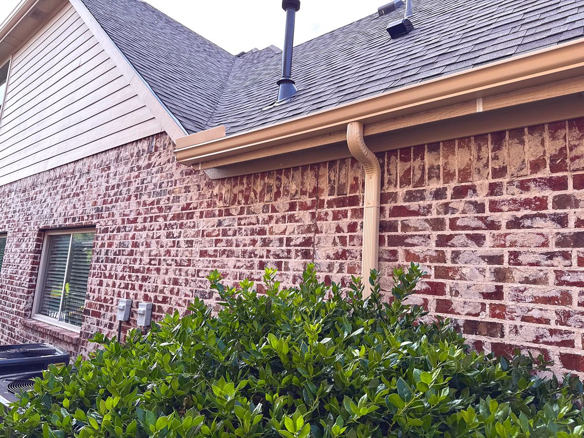 New gutter and downspout installation on a Garland, TX home ahead of fall rains