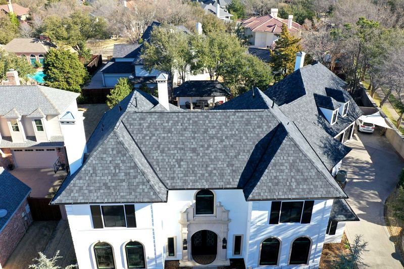 Seamless gutter and roofing work by Benchmark Roofing in the DFW metroplex