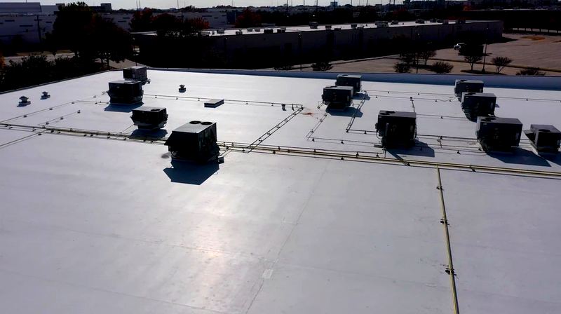 Hail and storm damage roof replacement completed by Benchmark Roofing in North Texas