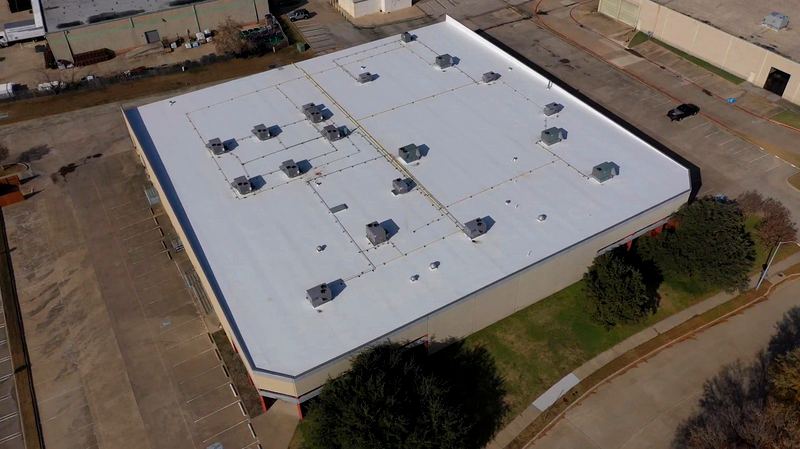 Completed residential roof replacement by Benchmark Roofing and Construction