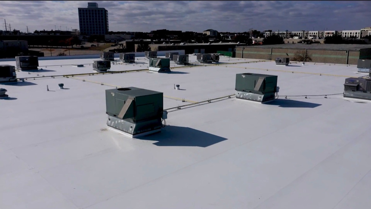 Finished commercial flat roof installation by Benchmark Roofing and Construction